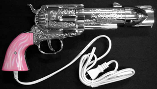 Illustration for article titled Gun Hairdryer Kills Wet Hair, Self-Respect